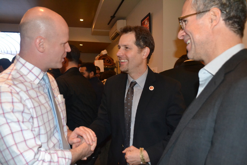 John McBride discusses the Electric Ladybug Garden with NYC Counclmember Mark Levine.